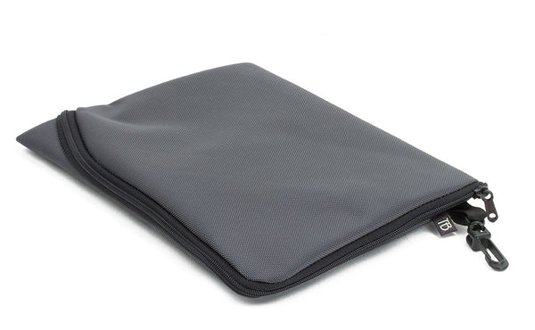 An A5 Ghost Whale Pouch in Nebulous Grey (dark grey).